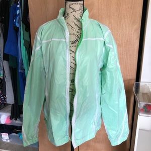 White with neon green windbreaker